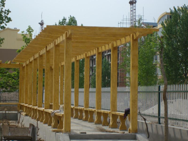 供应北京水泥仿木花架。