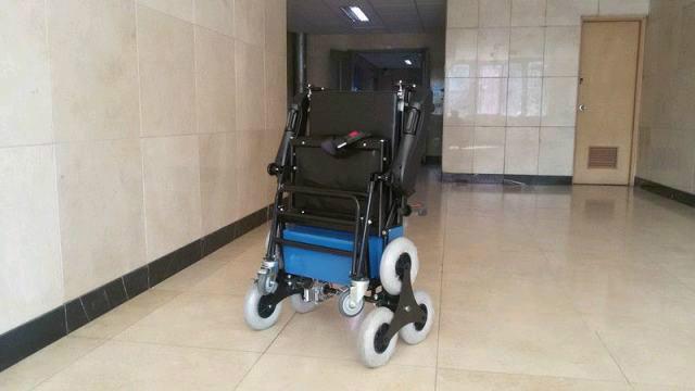 供应电动爬楼轮椅全折叠星轮电动轮椅图片